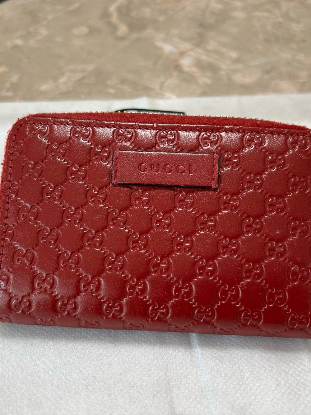Gucci Embossed GG Leather Wallet in Rich Red
